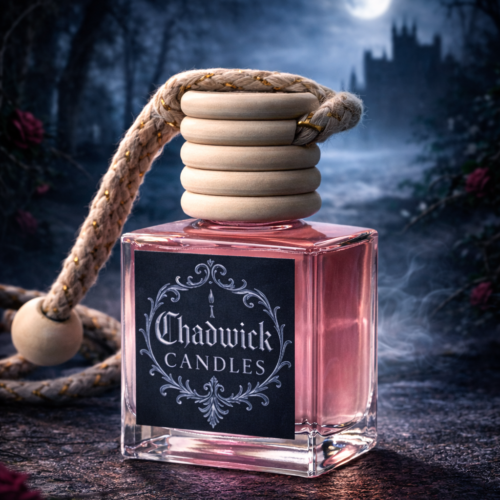 Chadwick Candles candle with a rope on a dark, forested background